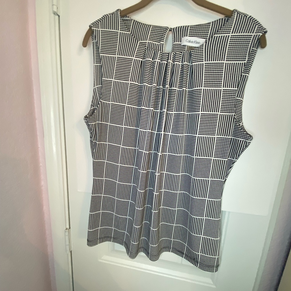 Calvin Klein shell top. Size large